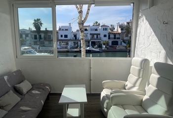 Estupendo piso con vistas al canal y parking privado en el centro de Empuriabrava PN IMMO ROSAS, PNIMMO ROSAS